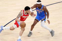 开云体育-灰熊客场胜马刺，吉布森发挥神勇，球队战术稳定